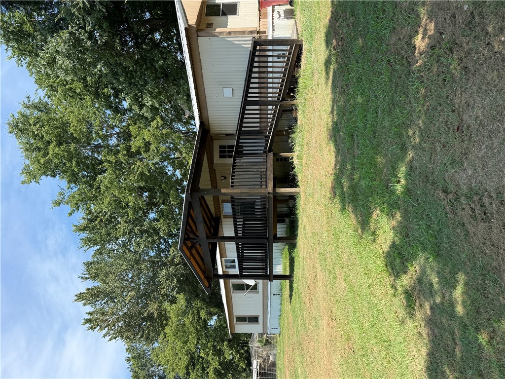 Check out this 3 bedroom mobile home with  0.62 acres outside of Russellville.