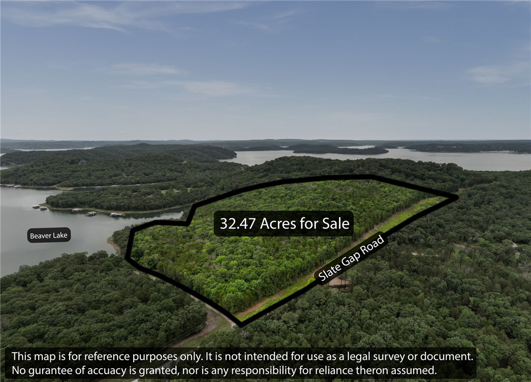 Discover this exceptional 32.47 acre lake front property offering a rare combination of expansive shoreline and lake views. This one-of-a kind tract provides potential development, multiple building sites, gentle rolling terrain, beautiful outcroppings, and ample space for a private retreat, luxury home, and of course future development. Enjoy direct access to the lake, and the tranquility of a secluded natural setting while still being convenient to nearby amenities. Whether you're looking to create a family compound, recreational getaway, or investment opportunity, this remarkable property offers endless possibilities in an unforgettable lakefront location.