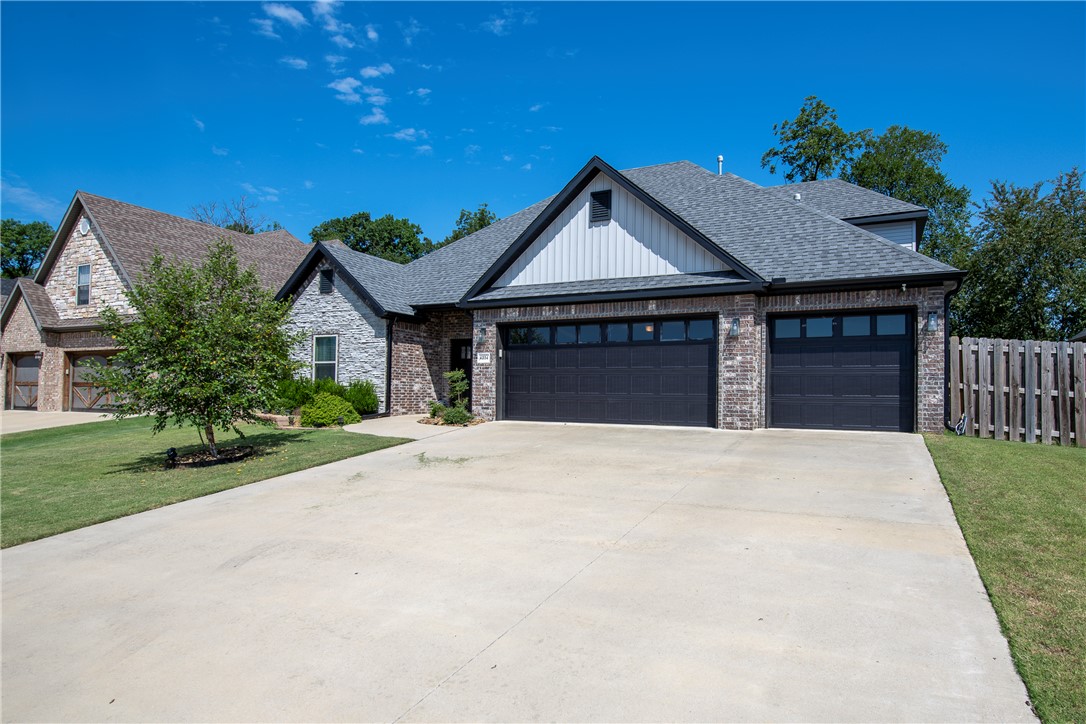 Welcome to this beautifully maintained 3 car garage, great bonus room or another bedroom plus 3 bath, south facing home in the highly desirable Willowbrook Farms community in Bentonville! This open concept home features soaring ceilings, elegant finishes, and spacious living areas perfect for everyday living and entertaining. The kitchen offers custom cabinetry, stainless steel appliances, and a large island flowing into the living and dining spaces. The private primary suite includes a spa like bath, walk-in tile shower, and generous closet space with laundry access. Enjoy a great private backyard with a covered patio, lush green space and a private back yard, and beautiful sunset views. Community amenities include a pool and dog park. Conveniently located near top rated Bentonville schools, Walmart HQ, Walmart Distribution Center, XNA Airport, and Creekside Park. In close proximity to trails, shopping, dining, and more!