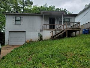 Home with basement; has newer HVAC system; nice kitchen cabinets, close to Woodland School