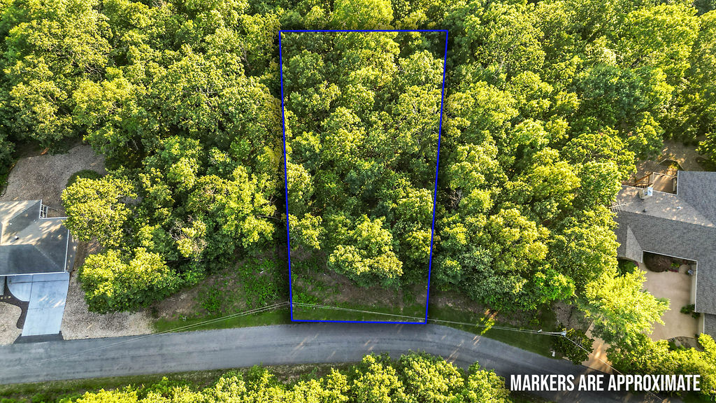 Step outside and you're seven-tenths of a mile from Scotsdale Golf Course — a recently renovated, links-style 18-hole track locals rank among Bella Vista's best. Point your bike the other way and Huntley Gravity Park's trail system is a quick three-mile pedal out. In between sits this .38-acre lot, carrying an even, buildable slope that's ready for whatever you're planning to put on it.

A fresh percolation test was just completed — full lateral line specs are already calculated for every home size, so there's no waiting on your own study before you can plan. Full report available upon request.

Loading rate: 0.57 gal/sq. ft./day
3-bedroom home — 395 ft. of lateral line
2-bedroom home — 265 ft. of lateral line
1-bedroom home — 135 ft. of lateral line

Add Lake Avalon's beach and kayak launch about two and a half miles out, and this lot puts you within easy reach of the golf, the trails, and the water that make Bella Vista what it is — whether you're building to live in it or to rent it out.