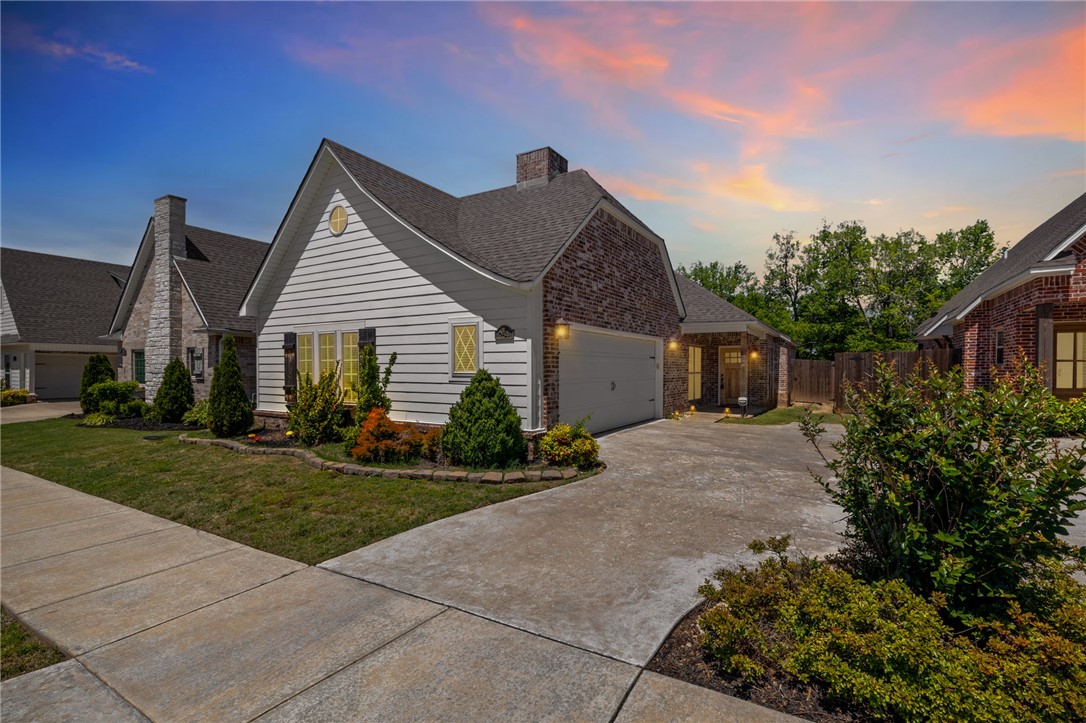 Charming single-family residence in Fayetteville, Arkansas! Built in 2019 and in great condition, this attractive property is just begging for its next adventure. Step into the heart of the home, where the kitchen is ready to whip up some culinary magic with its sleek stainless steel appliances and sophisticated counters. The peninsula is practically winking at you, inviting you to pull up a stool and share some secrets (or snacks!). The living room is where the real fun begins! Imagine cozy evenings by the fireplace, the crackling flames dancing alongside the gleam of the hardwood flooring. It's the perfect spot for board game battles or impromptu dance parties. When it's time to unwind, the bathroom offers a spacious layout and a walk-in shower that promises a refreshing escape. And for sweet dreams, the bedrooms boast lovely hardwood flooring, ensuring a smooth landing for your feet (and your imagination!).