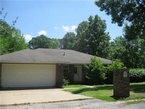 Beautiful home in the Cambridge Subdivision. Features include 3 bedrooms, 2 full baths. Laminate flooring in the living area, carpet in bedrooms. Wood burning fireplace. Sits on a corner lot with a chain link privacy fence. 2 car garage.