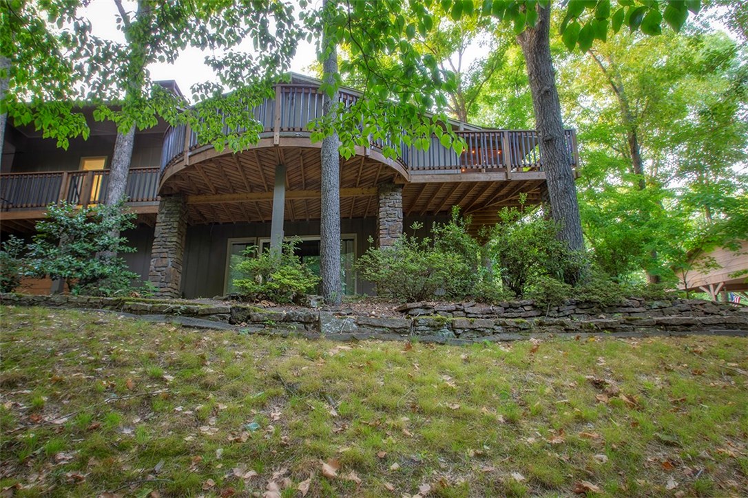 Very spacious 4 bedroom & 3 full  bath home. This house has been updated with new Wood floors, Master and guest bath totally updated, Newly painted, and New Deck with a enclosed side deck. Big kitchen with granite counter top. Master walk-in Shower has a spa wall mount system, great for after a long Day at work! And to all you Men looking for a "Man Cave", this one has it! Great downstairs area with Bar for the Guys get together or a separate living area for guest...plus bedroom & bath.