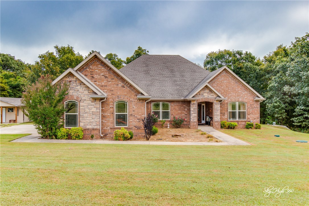 Beautiful home in a secluded, peaceful setting. Enjoy all the benefits of country living with 16 acres of land and gorgeous views! Home features detached storage building and a 3 car garage. Ideal for entertaining with open layout between living room and kitchen as well as a formal dining room! Spacious living room has fireplace and access to the patio. Huge kitchen with a breakfast nook is one in a million, with counter seating, island, granite countertops, stainless appliances, and more! Perfect for big family gatherings. Master bedroom has attached bath with whirlpool tub and walk-in shower. Additional bedrooms and bonus room provides plenty of space. This home will not disappoint!