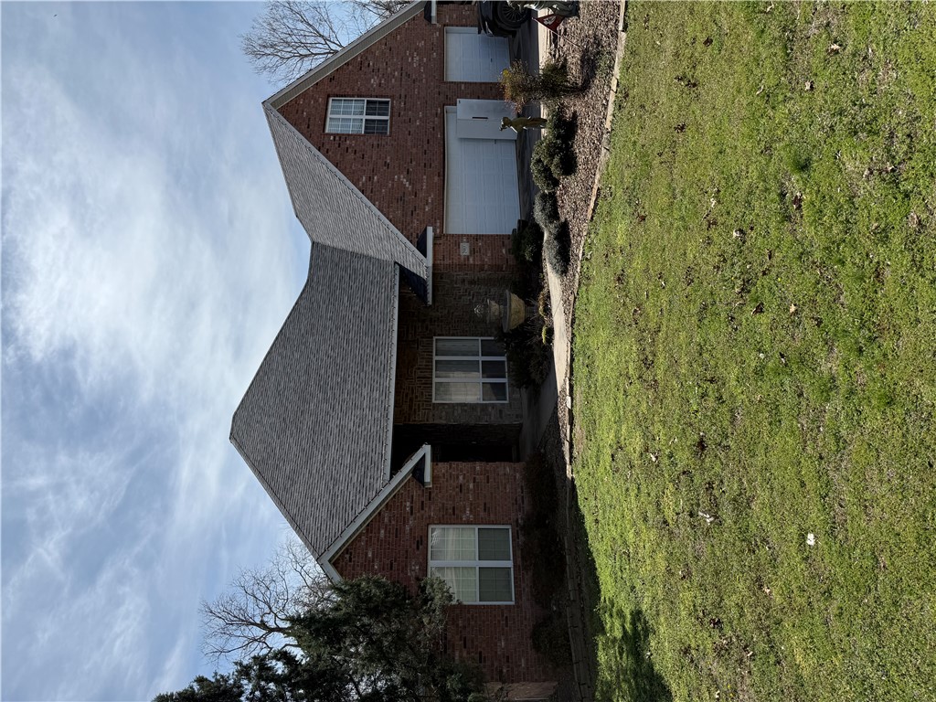 Price Reduction!! Motivated Seller - Quick Closing Possible - Bring all Offers!! Schedule your showing today!! Beautiful landscaped 3,250 sq ft home on 2+ acres in Springdale! Located at 2983 Wagon Wheel Rd, this property offers space, privacy, and versatility. This brick and rock home features 3 bedrooms, 2.5 bathrooms, soaring ceilings, and a grand entry. Large upstairs bonus room ideal for game room, theater, or office. Includes sunroom, cozy den with gas fireplace, an eat-in kitchen with island, granite countertops, and custom woodwork. 3-car garage and driveway have plenty space for parking, including RV parking. Exterior features include a large deck, new wood privacy fence, dog kennels, and a storage building. Additional land offers potential for expansion or possible residential office. Ideal for those seeking room to grow, hobbies, or quiet, peaceful living with convenient access to town. Excellent accessibility to I49 and to bike/walking trails. Close to JB Hunt headquarters and Springdale Public Schools.