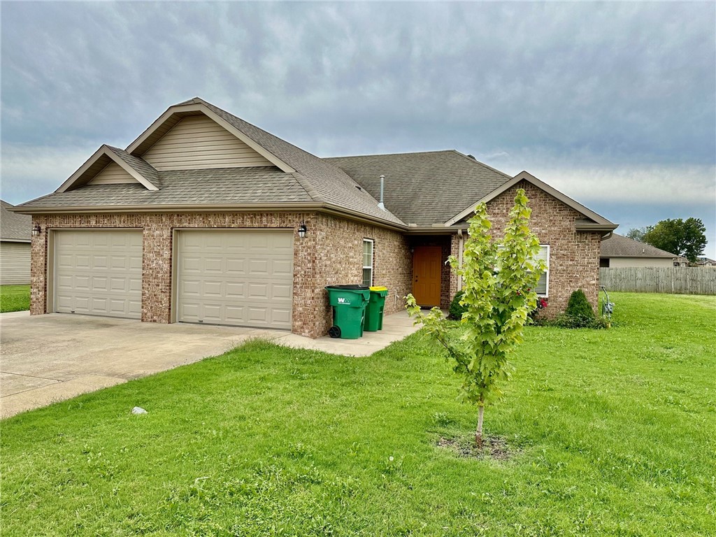 Refreshed Duplex has 2 Bdrm & 2 Baths and one car garage. Located near Wal-Mart Neighborhood Market,  shops & restaurants. Open floorplan with granite countertops and vinyl plank floors. Refrigerator included. No smoking, pets negotiable.