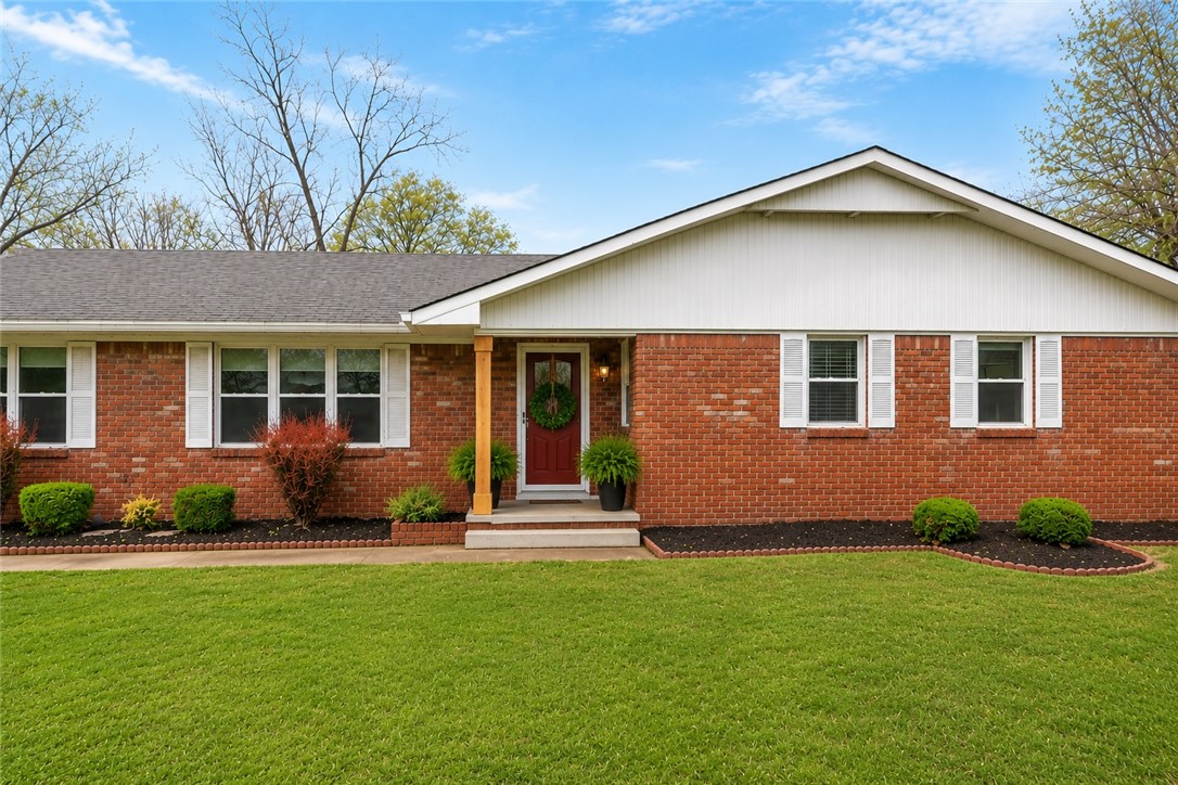 Welcome to 405 Magnolia Drive!  Discover the perfect blend of comfort and convenience in this charming 3 bedroom 2.5 bath Bentonville home.  Ideally situated in the heart of the city, you are within walking or biking distance to dining, shopping, trails, schools and all the vibrant amenities Bentonville has to offer.