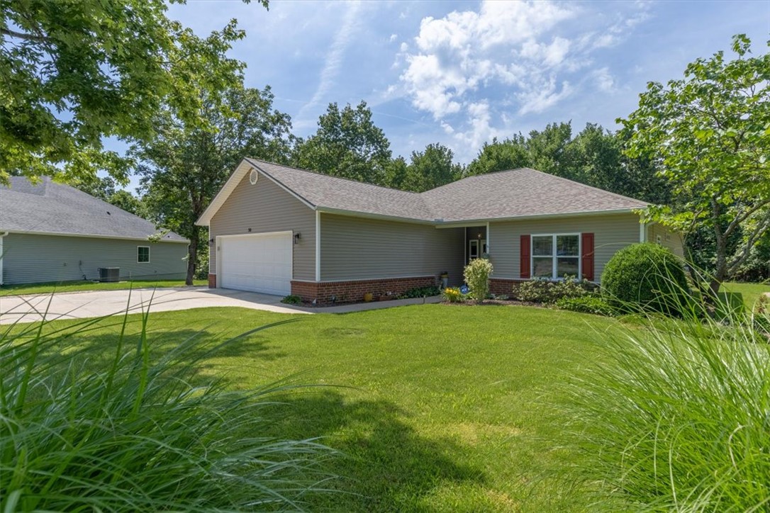 Welcome home to this meticulously maintained single-level retreat nestled on a private cul-de-sac lot surrounded by lush landscaping, fruit trees, berry bushes, and garden spaces. Beautiful wood flooring, crown molding, and a cozy fireplace create warm, inviting living areas. Offering 2 bedrooms plus a spacious bonus room or office with access to a screened porch overlooking the peaceful backyard. The kitchen features abundant cabinet and counter space, while the remodeled primary suite includes an updated bath and custom closet. Extensive upgrades throughout provide peace of mind—see amenities list for a complete overview.