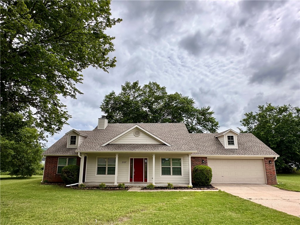Updated rental in midtown Fayetteville - 4 BR (or 3 with office) / 2 BA / 2 Car Garage on over 3/4 acres.  New windows, roof, countertops, flooring, paint, trim, blinds, hardware, fixtures, & appliances ready for new occupants.  Large lot with mature trees backs up to Gulley Park near Apple Seeds teaching garden. Yard care included.