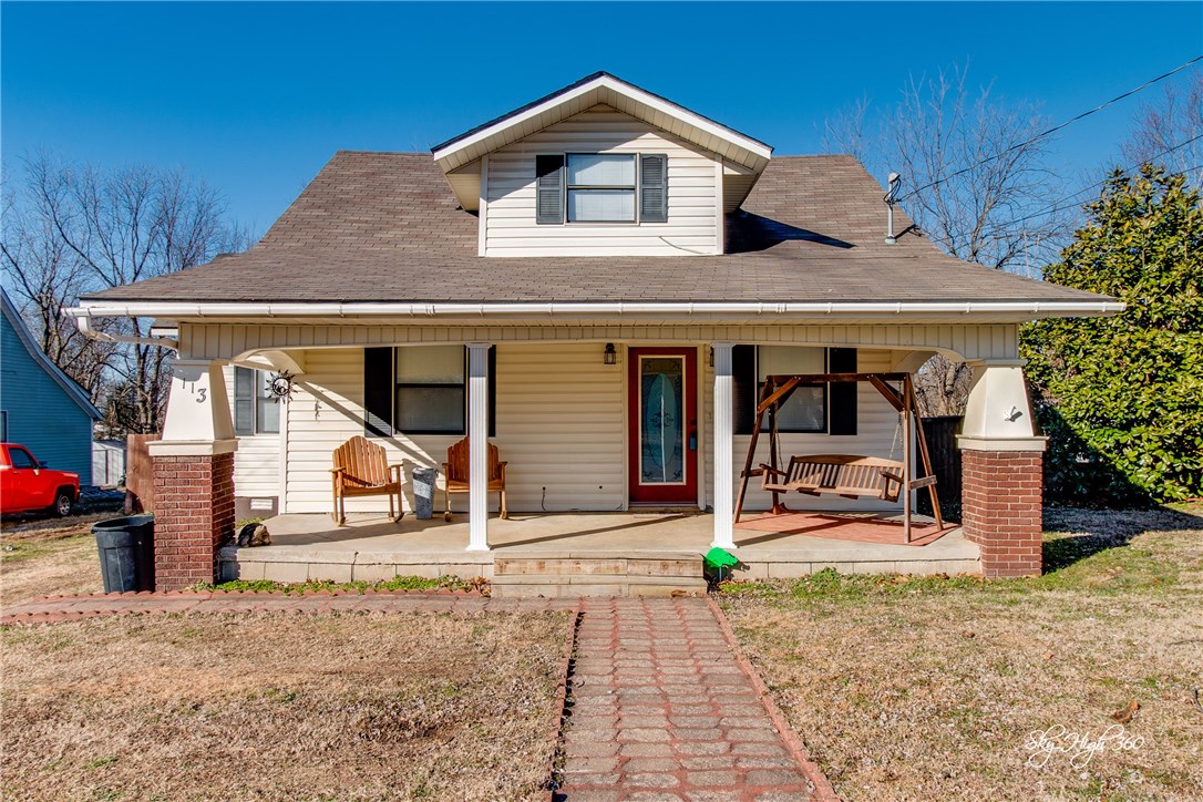 You will love this adorable home!  Enjoy relaxing on the covered porch.  The Open Floor Plan makes the house feel huge.  Three bedrooms and additional rooms for your creative usage:)  New Heat and Air installed in 2014.  The storage building in back has epoxy flooring and electrical run to it!  This is a solid home with a great view from the back yard.  Check it out today!