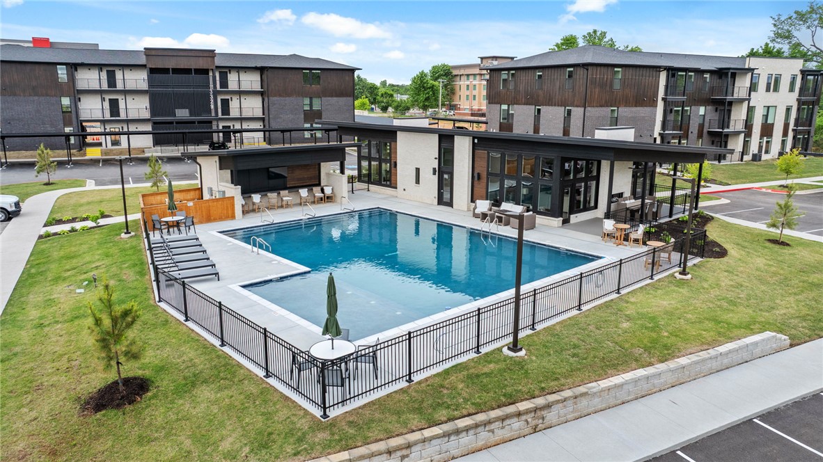Book Your Community Tour Today!! The three-bedroom Magnolia is the largest floor plan at Medlin Park Condominiums. This expansive plan features a generous open-concept living area that seamlessly flows into a well-appointed kitchen, ideal for entertaining and everyday living.
The primary bedroom suite is a true retreat, offering privacy and relaxation, complete with a spacious walk-in closet and en-suite bathroom. The additional bedrooms are generously sized, providing flexibility for guests, a home office, or hobbies. 

Medlin Park offers exceptional on-site amenities: a clubhouse with café area, refreshing pool, dog park, scenic fishing pond, and pickleball courts. Ideally located in southeast Bentonville, with easy access from I-49, residents will have direct access to the Greenway for walking & biking. Close to major employers like Northwest Medical and the new Walmart campus, as well as nearby attractions like Horsebarn Park, The Momentary, and downtown shopping and dining.