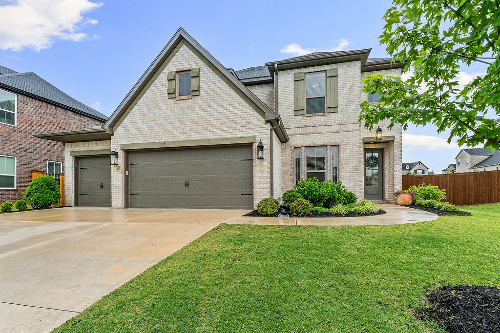 Modern elegance meets community charm in this stunning 4-bedroom, 3-bath  home. Situated on an oversized .27-acre lot of the highly desirable Allen’s Mill subdivision, this home offers unparalleled curb appeal with its brick exterior and a spacious 3-car garage. Inside, you’ll find an expansive, sun-drenched open layout featuring an eat-in kitchen with custom quartz countertops, a standalone pantry, and high-end gas appliances. Relax by the fireplace in the family room or step outside to the covered patio to enjoy your generous backyard space.