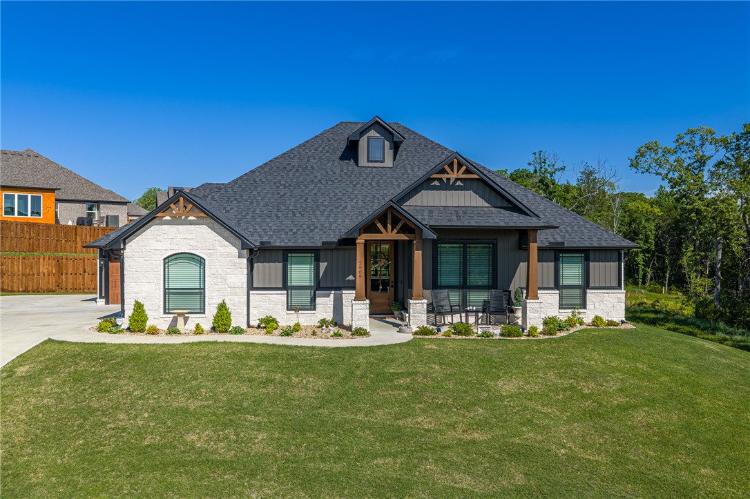 Step inside and feel like you’ve walked straight into the pages of a magazine—this one is a showstopper you don’t want to miss! Every detail has been thoughtfully designed, offering both style and function. This total electric home features an open-concept layout with 10-foot ceilings and split floor plan. From crown molding to wood-look ceramic tile flooring, attention to detail is undeniable. Indirect lighting adds warmth and ambiance for everyday living or entertaining.

The kitchen is the heart of the home—large quartz island with bar seating, farmhouse sink, updated appliances, pantry, soft-close cabinetry, and pull-out drawers. Rock fireplace anchors the living space.

The 4th bedroom offers flex space or home office. Primary suite features marble tile shower, soaking tub, dual sinks, quartz countertops, walk-in closet. Outside, enjoy privacy fence, covered patio, backyard for relaxing or entertaining. 3-car garage includes insulated doors and extra parking. Schedule your showing today!
