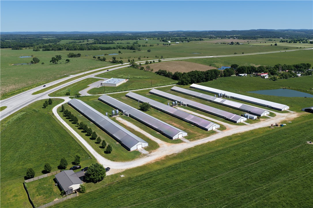 Turn-key Northwest Arkansas poultry farm for sale in Hindsville, Arkansas featuring six 43x500 pullet houses on 13.7 acres currently under contract with Tyson Foods. Conveniently located just off Highway 412, this income-producing operation is fully equipped and ready for immediate use with established infrastructure, on-site housing, equipment, and proven production capability.

Farm improvements include a 50x60 shop, water shed with restroom, three water storage tanks servicing the poultry houses, in-ground storm shelter, and incinerator with 300-gallon diesel tank. A generator with additional 300-gallon diesel tank and extra poultry house parts on hand at closing are also included.

Equipment conveying, a 2026 Kawasaki Mule, 2025 Kubota MX6000HST tractor (32 hours), and 2025 Kubota ZD1211-60R mower. Property also features a 1,600 sq ft 3 bed/2 bath manufactured home and a 2021 Cruiser Radiance 30DS travel trailer. Excellent setup for growers or investors seeking an income-producing Arkansas poultry farm.