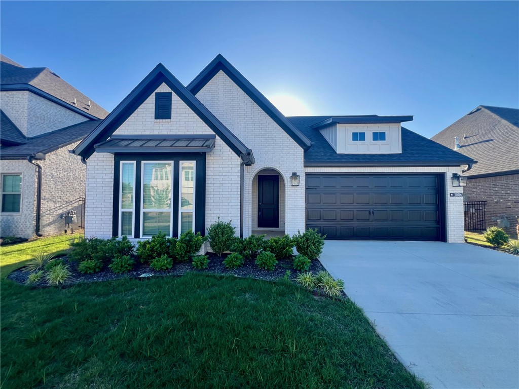 Built in 2025, this 3-bedroom, 2-bath home offers a highly practical, single-level layout designed for comfortable everyday living. The open-concept main living area flows seamlessly into the kitchen and dining space, creating an efficient setup for both relaxing and entertaining. The split-bedroom floor plan provides added privacy, with a spacious primary suite featuring an en-suite bath and walk-in closet, while two additional bedrooms share a full bath. Enjoy a functional kitchen with ample cabinet storage, generous counter space, and easy access to the backyard—ideal for outdoor use and low-maintenance living. Conveniently located in the heart of Rogers, this home offers quick access to Pinnacle Hills Promenade, nearby schools, dining, and I-49, making commuting and daily errands simple. A great rental opportunity combining comfort, layout efficiency, and prime Northwest Arkansas accessibility.