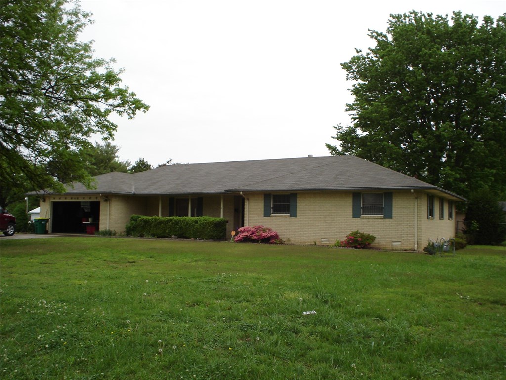 What a great opportunity! Estate sale! All brick 3 bedroom, 2.5 bath home located in middle of Springdale with over 2 acres of land. Fenced with garden, green house, shop, horse barn, and garden shed.