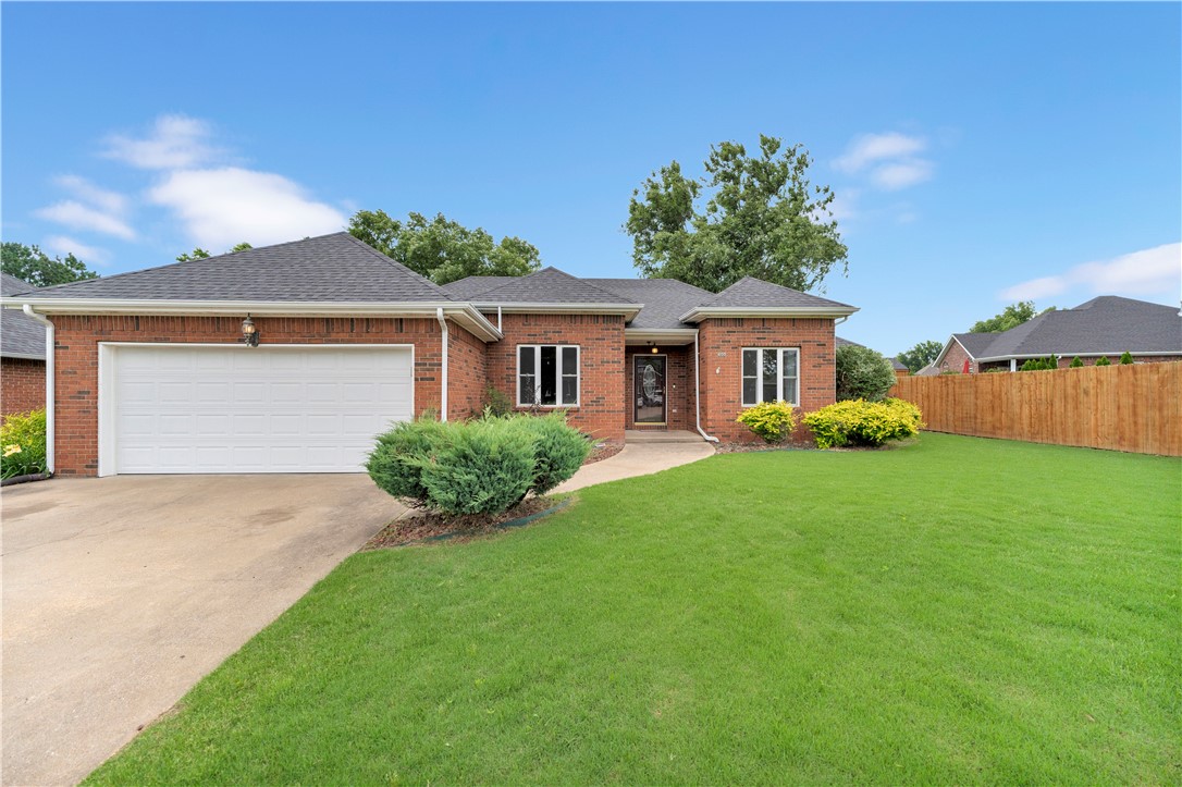 Tucked away in the desirable Ravenwood Subdivision, this split floor plan home offers the perfect blend of comfort, convenience, and value. The open-concept layout seamlessly connects the living, dining, and kitchen areas, creating an ideal space for both everyday living and entertaining. Enjoy easy access to the community pool, schools, parks, shopping, and dining while still enjoying the tranquility of a residential setting. Recent updates include brand-new carpet, and a $5,500 flooring allowance gives buyers the opportunity to customize additional flooring to match their personal style. Preferred lender, Angie Molina with Benchmark Mortgage at 479-531-1712, offering up to 1% of loan amount in credits for qualified buyers. The refrigerator, washer, and dryer will convey, making this home truly move-in ready. Don't miss this opportunity - Schedule your showing today!