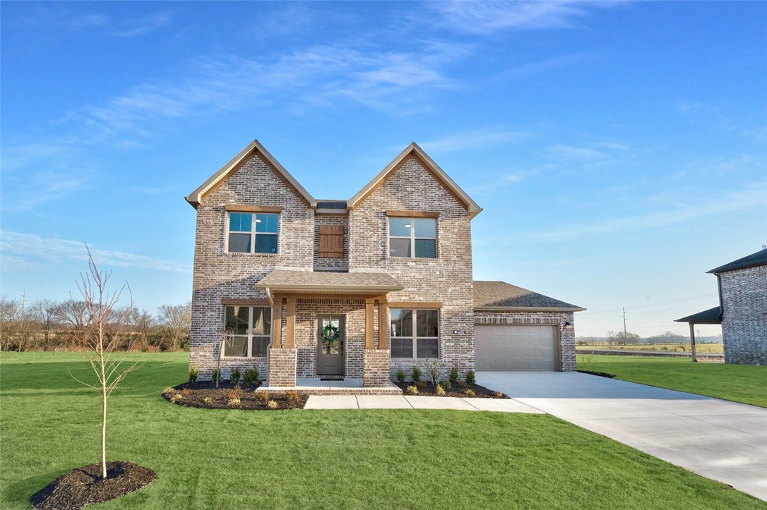This beautifully designed home features an open-concept layout that seamlessly blends the kitchen, dining, and living areas. The designer kitchen impresses with quartz countertops, a gas cooktop, ceiling-height cabinets, and charming windows beneath the uppers for natural light. A covered patio offers the perfect outdoor retreat—a place to relax and unwind. Stylish, functional, and filled with thoughtful details—this home is a must-see. Located less than 5 miles from XNA National Airport and just minutes from all that Bentonville and Centerton have to offer, this vibrant community combines small-town charm with exceptional convenience. Close to Walmart's New Home Office for those looking to relocate.