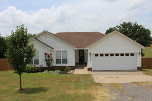 Lovely home like new on almost an Acre on West end of Russellville! 3 bedrooms, 2 baths, walkin master closets, kitchen with pantry, insert in living room, 2 car garage, screened porch and large fenced in back yard.