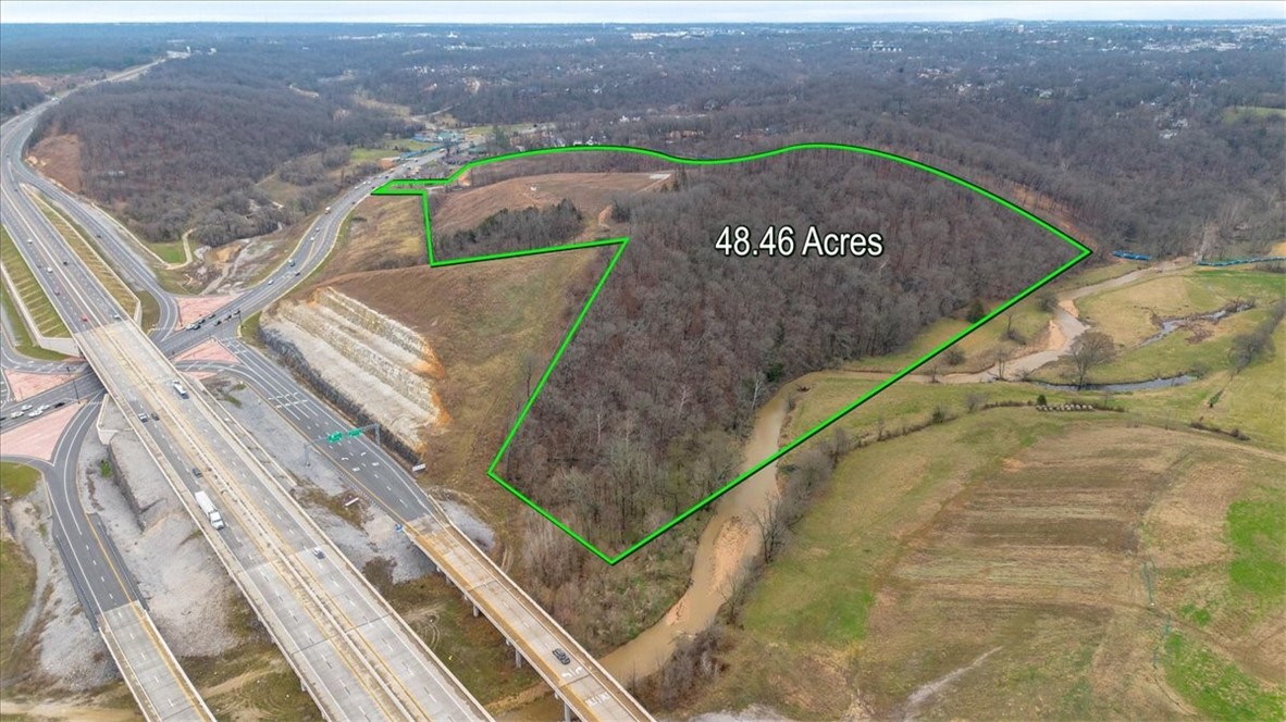 Vacant land, see MLS #1337806. Perfect spot for mixed use development! This is an iconic site location that can be seen for miles off I-49 and would be the 1st thing welcoming patrons into Bentonville off N Walton Blvd. Perfect for hotel, restaurants, townhomes, cabins, bike park/resort and more!