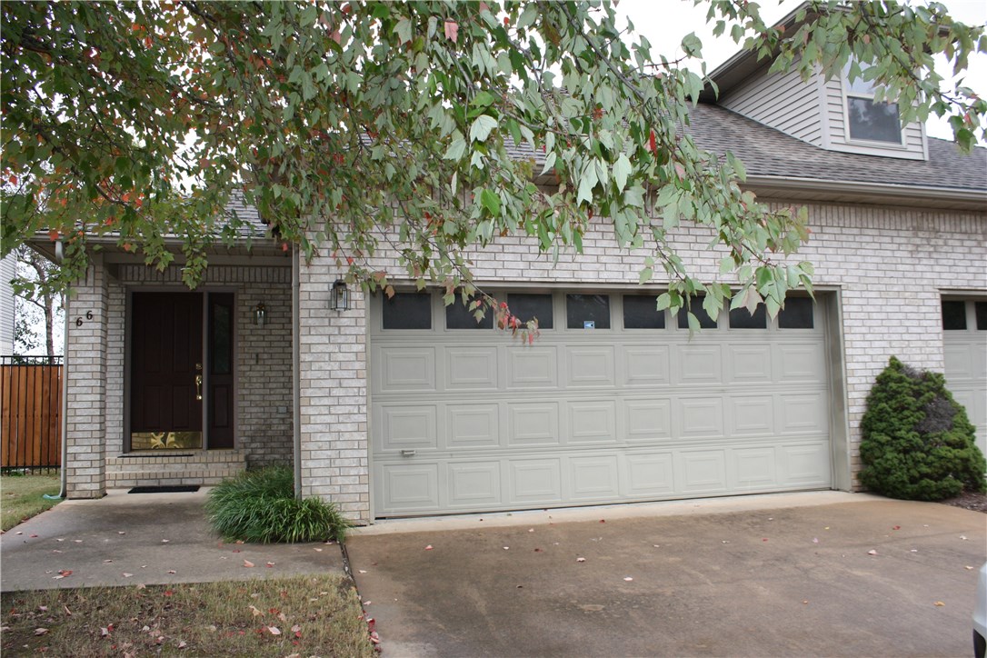 Two bedroom, two full bath condo in great location! Near WA Regional Hospital and Greenway walking trails. Large open living room with vaulted ceiling, new wood floors and cozy gas fireplace. The kitchen is open to the living area w/ breakfast bar, lots of cabinets, full-size stainless steel refrigerator, dishwasher, range & microwave. Huge walk-in master closet, stand up shower. Guest bath has shower/tub combo.  2-car garage. No pets please. Move-in ready! Call today!!