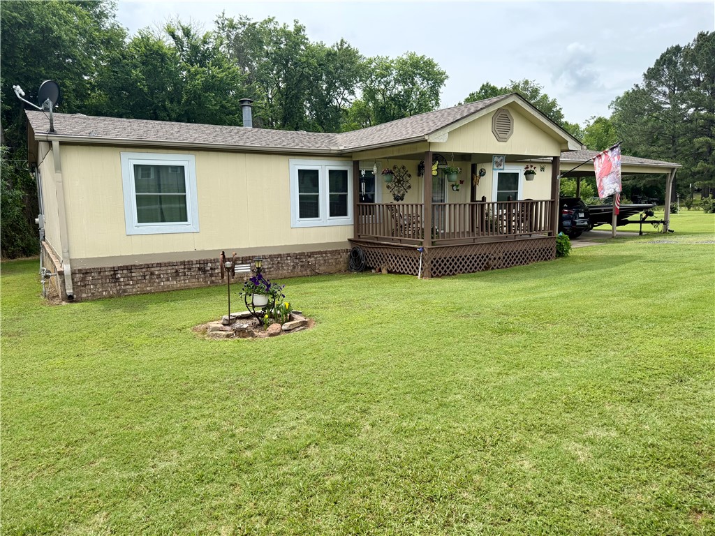 Set on a .75 acre, this 1,344 sq ft modular home offers a well- designed split floor plan with 3 bedrooms and 2 bathrooms. Recent upgrades include a new roof and new windows. The living room features a cozy fireplace, while the Primary suite bathroom features a beautiful antique soaker tub. Outside, enjoy the many established blackberry bushes along with a mature peach an apple tree, and two detached outbuildings creating a peaceful, productive setting ideal for relaxed country living.