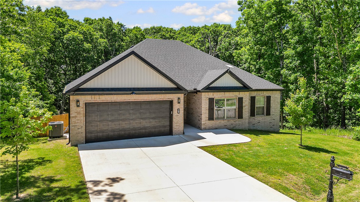 Built in 2024, this move-in ready 3-bedroom, 2-bath home offers modern comfort in one of Bella Vista’s most desirable locations. Tucked away at the end of a secluded cul-de-sac, this property provides rare privacy while still being minutes from everything outdoor enthusiasts love. The thoughtfully designed open-concept layout is filled with natural light and custom built-ins, creating the perfect space for entertaining and everyday living. The spacious living area centers around a cozy fireplace and flows seamlessly into the kitchen and dining areas. The private primary suite offers a quiet retreat, while the split floor plan includes 2 nicely sized secondary bedrooms with a full bath. Enjoy the double-gated wood privacy fence and quick access to the Back 40 Trail system, Metfield Clubhouse, Dogwood Golf Course, area lakes, and outdoor recreation.Appliances, furniture, decor, Starlink, lawn care equipment convey with acceptable offer, making this an exceptional opportunity in a prime Bella Vista location.