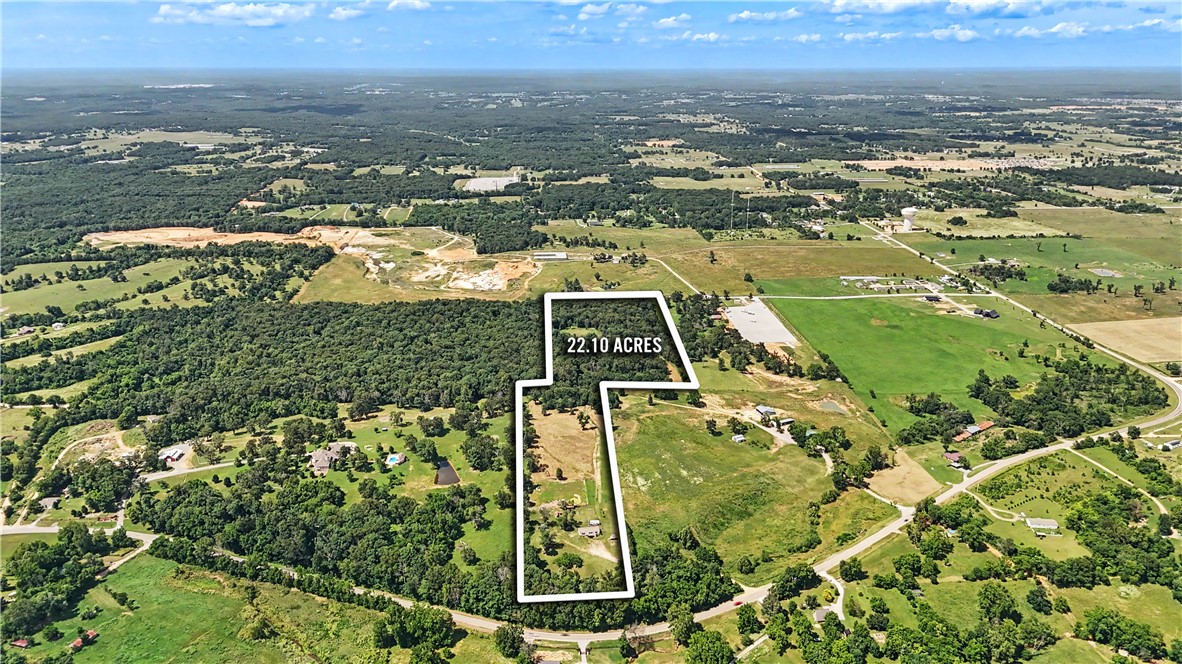 Capitalize on Northwest Arkansas’ growth with this exceptional 22.10 acre development in the path of progress. Featuring mostly level, easily clearable terrain featuring minor rolling topography and minimal woodland coverage. Dual access points include Highway 102 and a paved entrance on Joann Lane. Situated in immediate proximity to the current city limits, this exceptional tract features on-site utilities and prime development potential.
Additional 25.04 acres available at neighboring property. MLS# 1347703, 14410 & 14430 W Highway 102, Gravette, AR 72736