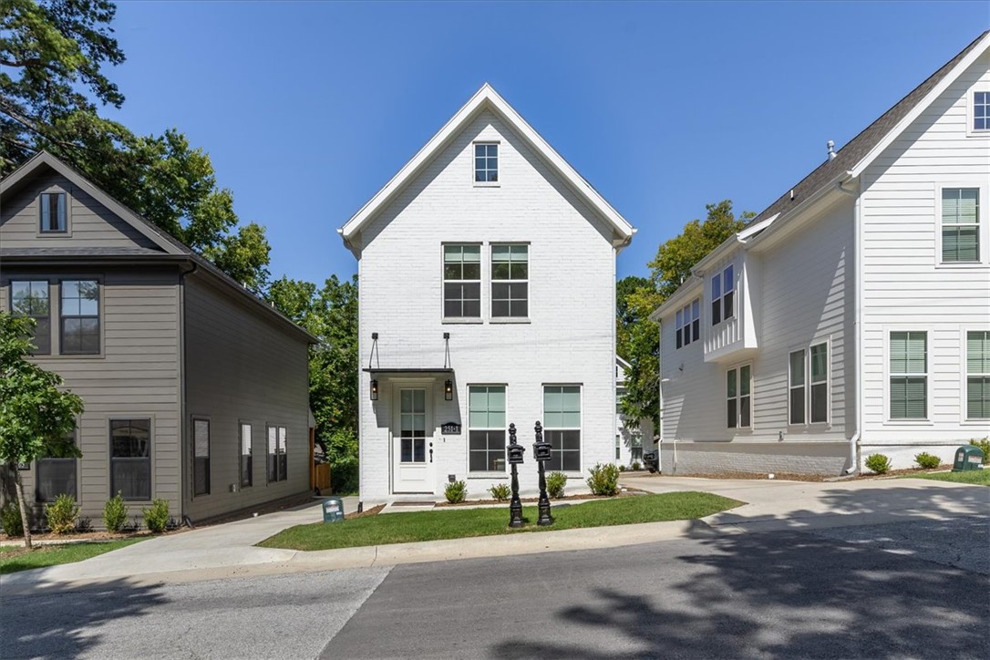 Rare opportunity to own not one, but 2 homes just off the Fayetteville Square!! Property is a 1768 sq ft, 3 bed, 2.5 bath home in front with a detached 1200 square ft. 2 bed, 2.5 ADU in back. Walking distance to The Square, Farmers Market, Dickson St, Walton Arts center, state of the art Public Library, shopping, coffee shops, and several Fayetteville staple restaurants including Hugo's, Feed & Folly, Cheers, Atlas, Tula, Vetro 1925, Taste of Thai, Tiny Tim's Pizza and several more! Easy bike or commute to the University of Arkansas, Razorback Stadium, Bud Walton Arena (The Basketball Palace of Mid-America) & Baum Walker. Both homes feature Hardwood Floors throughout, quartz counter tops, gas range, open layout, low E Windows, and so much more! Don't miss out on this rare opportunity to own 2 amazing homes right in the middle of Downtown Fayetteville! Perfect opportunity to live in one, a rent out the other.