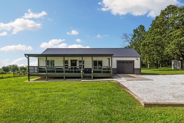 Quiet rural property on 3 acres with two homes, a large shop building, and plenty of room to enjoy the outdoors. The main home has been thoughtfully remodeled with a farmhouse-style design featuring plank ceilings, original hardwood floors, and barn door accents. The kitchen offers ample cabinet space, butcher block countertops, a farmhouse sink, and a walk-in pantry. All three bedrooms are generously sized, and both bathrooms have been updated within the last year. The second home (ADU) features an open floor plan with vaulted ceilings, a walk-in pantry, and two bedroom suites. The primary suite includes an oversized closet with a built-in shelving system. Additional features include an epoxy-coated garage floor and a large screened-in porch overlooking the back of the property. The heated & cooled 30' x 30' shop is equipped with workbenches, shelving, storage space, and utility sink with hot water. An attached 30' x 10' lean-to provides covered parking for equipment and tools. See ML# 1349824