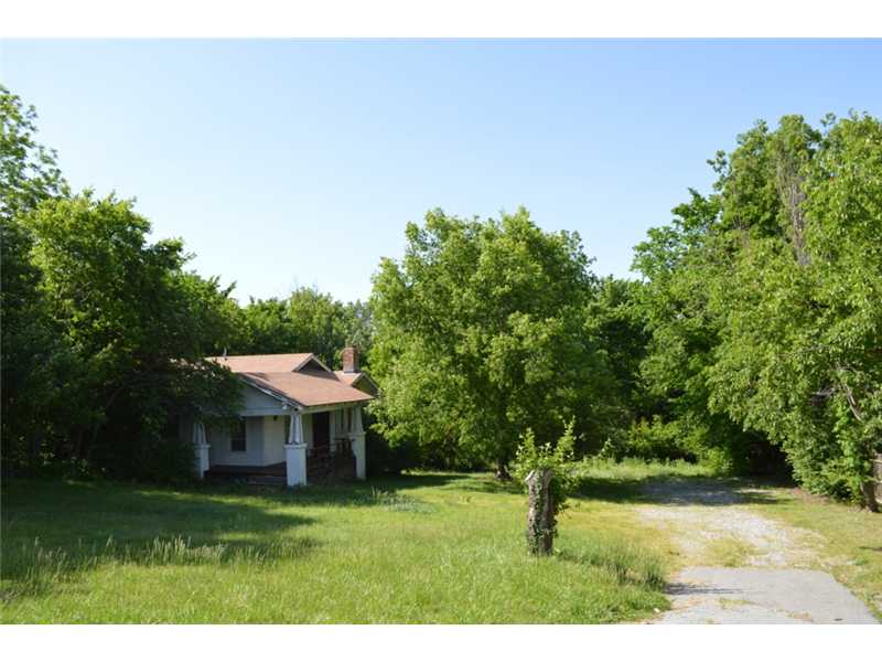 1.62 AC of prime real estate <than 250' from N College Ave/Hwy 71B on E Sycamore St zoned CS/Community Services. 3 parcels create 237'x295' tract. 1940's 1,030 sf home currently rented by tenant sits on property but value is in the land. Don't miss out,on this fantastic investment opportunity. "...The Community Services district is designed primarily to provide convenience goods & personal services for persons living in the surrounding residential areas & is intended to provide for adaptable mixed..."