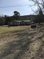 Adorable 3 Bedroom 1 Bath home with a sun room! This home was recently updated with hardwood flooring, and new kitchen counter tops with matching back splash! Home has lots of room, and even sits on .50 of an acre, with a small fenced in area for those family pets!