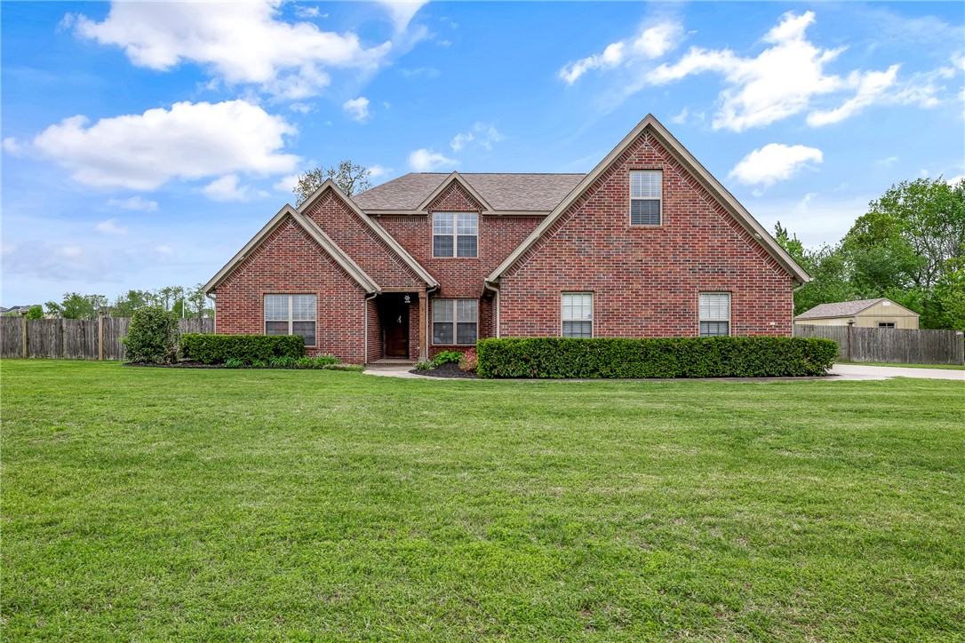 This 1.18-acre corner lot offers spacious living and a private saltwater pool oasis. The open living room features a cathedral ceiling with wood beams, gas fireplace, and abundant natural light. The kitchen includes granite countertops, a double oven, and an oversized pantry. Roof replaced October 2024 The main level offers a primary suite and walk-in closet, an additional bedroom, bathroom, and a bonus room. Upstairs features a second living area with a wet bar, plus two bedrooms, including one with a walkout bonus room. Enjoy the saltwater pool, and there is a generator for just in case of emergencies, and a three-car garage with a built-in storm cellar. Conveniently locate right beside Shaw Family Park, zoned for Harbor schools, and close to restaurants and shopping.