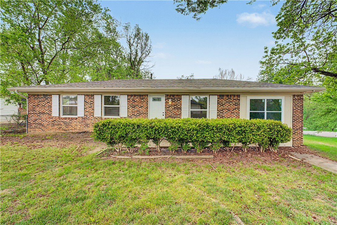 Welcome to 2104 W Wood Street in Rogers! Situated on an oversized 0.41-acre corner lot, this property offers plenty of outdoor space for entertaining, gardening, future improvements, or simply enjoying extra room to spread out. Inside, you'll find 3 bedrooms, 1.5 bathrooms, tile flooring throughout, granite countertops, and fresh recent paint. A versatile bonus room provides the flexibility for a home office, playroom, second living area, workout space, or hobby room to fit your lifestyle. Conveniently located near Grace Hill Elementary, Oakdale Middle School, and Rogers Heritage High School, with easy access to shopping, dining, parks, and vibrant downtown Rogers. Don't miss this opportunity to own a home with both space and convenience in one of Rogers' most desirable areas!
