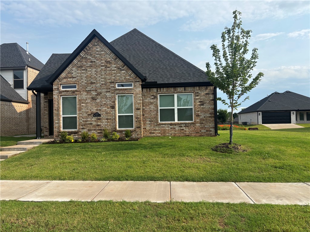 This beautiful four-bedroom, three-full-bath home is located right in the heart of Bentonville. It features luxurious LVP flooring throughout the main living areas, with tile in all bathrooms and carpet in the bedrooms and staircase leading to the second floor. The home is thoughtfully laid out with two bedrooms on the first floor and two additional bedrooms plus a bath on the second floor, one of which has direct access to the bathroom. The primary bedroom includes a spacious shower for added comfort. 
The kitchen stands out with granite countertops and a desirable gas range, making it a chef's delight. The home is also equipped with a washer, dryer, and refrigerator, and it includes a spacious laundry room. There's a convenient drop zone right by the entrance from the two-car garage, perfect for hanging backpacks, keys, and coats.
With its low maintenance fenced in yard and proximity to a local school, this home is ideal for families looking for comfort and convenience.