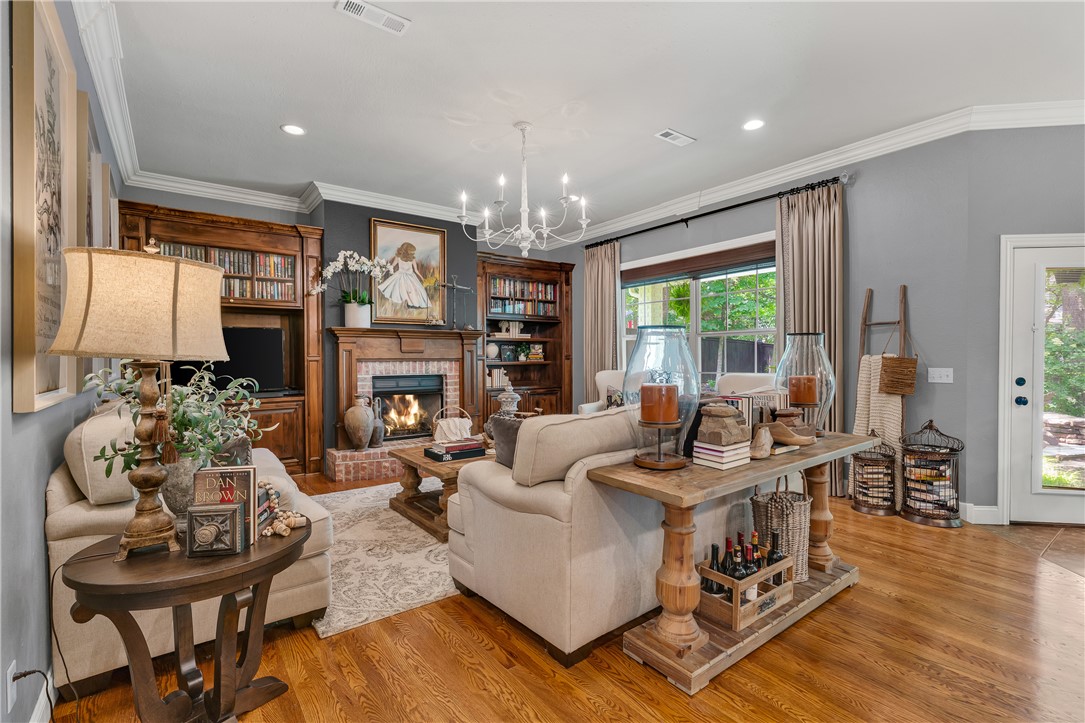 Beautifully updated 4-bedroom, 3.5-bath home in a sought-after neighborhood with a community pool and pickleball courts. Designed for both comfortable living and entertaining, this home offers elegant finishes, abundant natural light and a functional floor plan. Featuring an island kitchen with a new microwave surround, this space opens to the main living areas for effortless entertaining. Spacious primary suite offers a jetted tub, walk-in closet and private deck access, complemented by an additional bedroom on the main level. Upstairs you'll find two generous bedrooms connected by a Jack & Jill bath, a versatile bonus room and attic storage. Recent updates include fresh designer interior paint (2024), upgraded lighting (2025), plush carpet and exterior paint completed in 2021. Enjoy outdoor living with a stone fireplace, flagstone patio and a peaceful backdrop of mature spruce and oak trees. Conveniently located near trails, parks, schools and shopping, this home offers the perfect blend of style and convenience.
