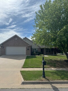 Beautiful 3-bedroom, 2-bathroom home in the Legacy Heights subdivision in West Fayetteville! This inviting home features a covered front porch, a spacious living room with a cozy corner fireplace, and elegant crown molding details throughout. The eat-in kitchen offers granite countertops, tiled backsplash, an island, and plenty of space for cooking and gathering. The large primary suite features a tray ceiling and a private ensuite with a double-sink vanity. Two additional bedrooms and a full bath provide comfortable living space for family or guests. Step outside to enjoy the large fenced backyard, perfect for relaxing, entertaining, or enjoying the outdoors.**$250 non-refundable pet fee per pet**