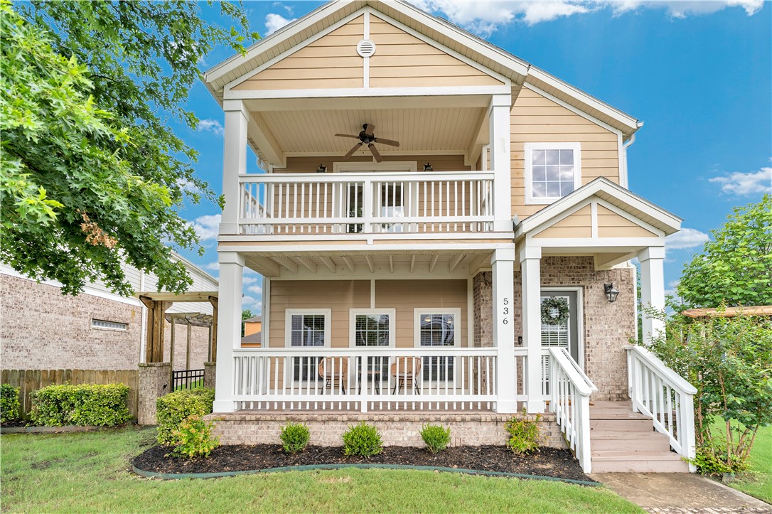 Turnkey rental opportunity just 2 miles from the University of Arkansas. Ideal for students, professionals, or Razorback fans with easy access to campus, 3 university bus stops, and the Razorback Greenway for biking to class, work, or the stadium. Well-maintained 3BR/2.5BA featuring an open-concept layout, granite countertops, stainless appliances, gas-log fireplace, covered front porch, upper balcony, and private patio with arbor. Spacious primary suite with walk-in closet, custom shower, jetted tub, and private covered balcony. Secondary bedrooms feature walk-in closets and a Jack-and-Jill bath with separate vanities, ideal for roommates and maximizing rental appeal. HOA covers yard and landscaping. Major updates include new roof & HVAC (2020), interior paint (2024), Ecobee smart thermostat with remote sensor, Ring security cameras, and carbon monoxide detectors, providing modern comfort, enhanced safety, and peace of mind. Move-in ready with excellent long-term rental potential.