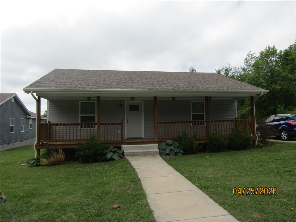 Lovely modern home in subdivision neighborhood. 2 bedroom 1.5 bath open floor plan kitchen/dining/living. Home was built in 2022 so all modern finishes and appliances stay with the home. Big covered front porch perfect to sit outside and enjoy a visit with the neighbors. Extra Storage in carport area. Location is 3 minutes to Berryville Community Center, 1 minute to Main Theatre for a movie.