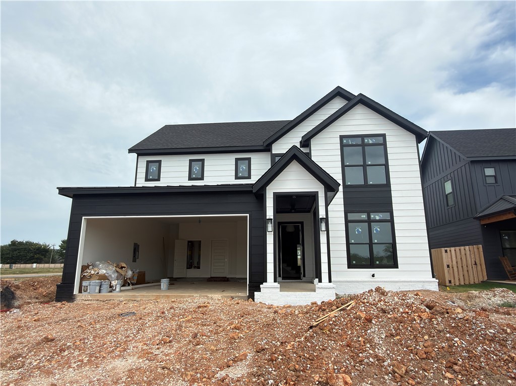Right now buyers can receive $20,000 towards incentives!!! Gorgeous new construction home in best location in NWA! This plan features 4 bedrooms (2 down/2 up), 3 full baths, and oversized 2 car garage. Kitchen is fully equipped with built-in oven, microwave, gas cooktop, walk-in pantry, and large island! Unwind in your peaceful primary bedroom with a soaking tub, large walk-in shower with dual shower heads, separate vanities, and large closet with tons of storage! Bedroom 2 and full bath are on other side of home on main level. Upstairs you'll find bedroom 3,4 and a full bathroom. Back covered patio makes a great place for the family to hang out and grill. Enjoy the Meadow Brook playground that is a short walk from this home or across Bellview you can access the Razorback Greenway Trail!