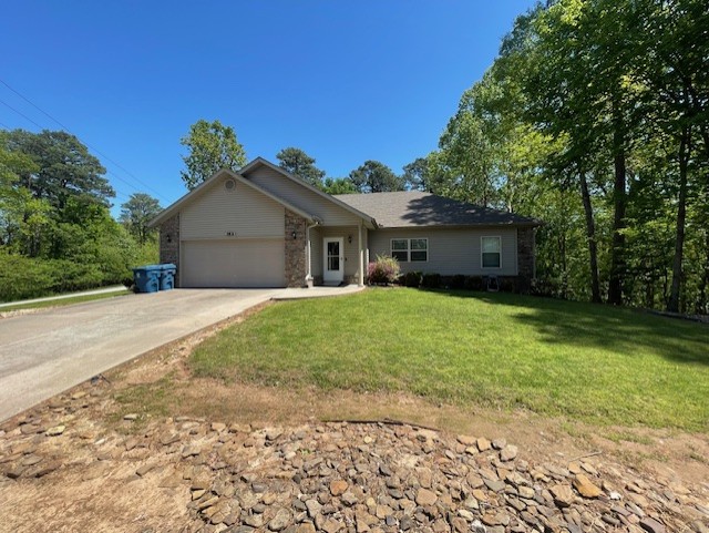 Seller is offering $10,000 in Seller Concessions. Excellent location close to town Center and the Missouri line. Home is on sewer, this house has been well maintained, but needs some cosmetic updates. Home has a big bonus room that could be converted into a third bedroom. Big yard partially rock on a corner lot.