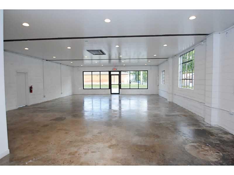 Wood Stroud Add Rogers - Commercial Lease