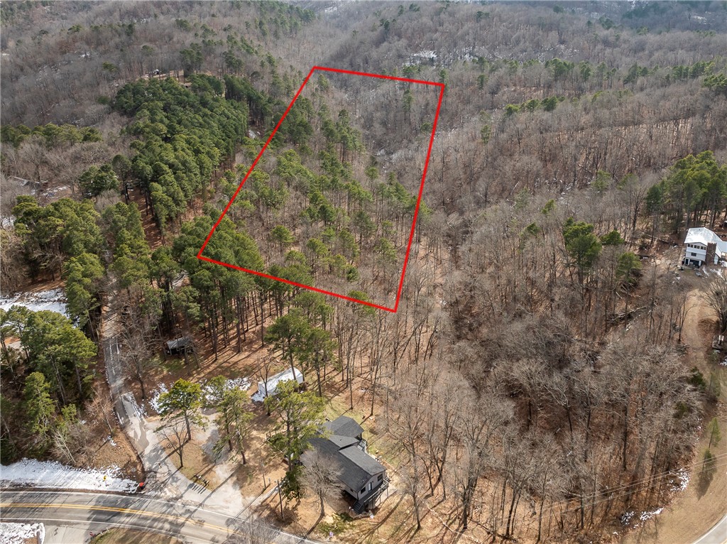 Hunters paradise! If you are looking for privacy in the woods, you will find it here. Your retreat stretches back to Hobbs State Park. Enjoy the sounds of nature and the spring feeding through. This is a recreation dream. Electricity available at the street. Land sale is contingent on sale of adjacent parcel.
