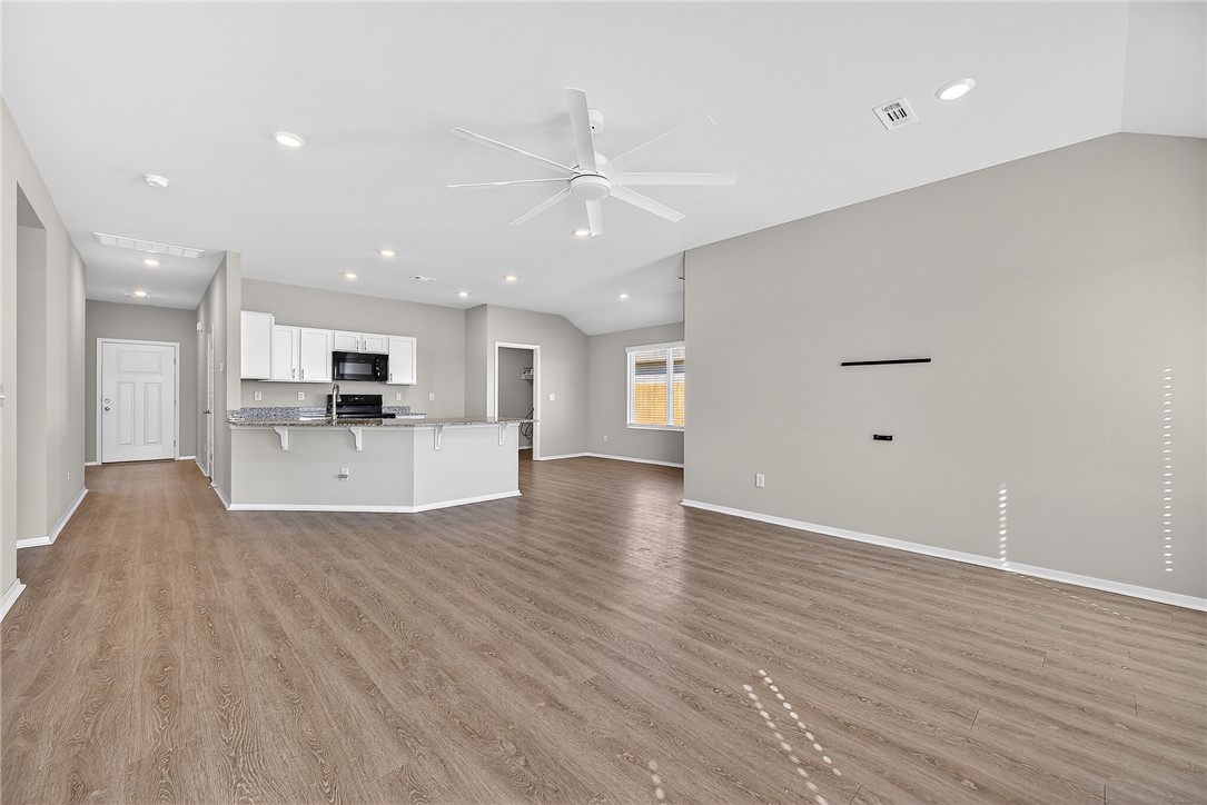 Skip the wait and step into a home that feels brand new, without the added expense. This beautifully maintained Ross plan offers the perfect blend of style, function, and convenience, with upgrades already in place like fencing and window blinds. From the moment you arrive, you’ll notice the charming curb appeal, welcoming covered entryway, and landscaped yard. Inside, the open-concept layout is designed for easy living, featuring a spacious family room that flows seamlessly into the kitchen and dining area, ideal for both everyday life and entertaining.The kitchen is equipped with energy-efficient appliances and generous counter space, creating a functional and inviting space for cooking and gathering. With 3 bedrooms and 2 bathrooms, this home offers comfortable, well-designed spaces for families, guests, or a home office setup.
Enjoy the benefits of new construction without the extra costs or hassle, this home is truly move-in ready and waiting for its next owner.