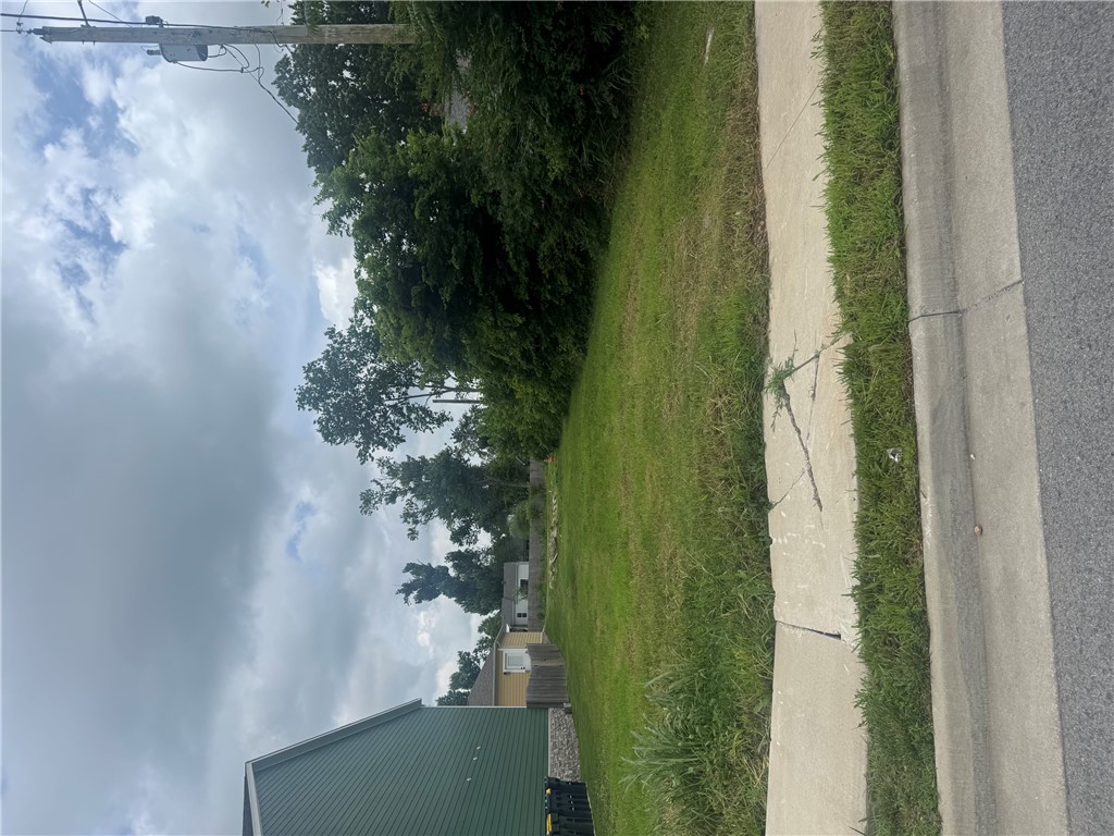 Downtown Rogers buildable for home or investment. The lot is 47 ft x 185 ft. Alley on back of property for optional rear loading garage or garage apartment. 3 sewer and 3 water meters for multi-family or business. 1 1/4 water meters for residential fire sprinklers if wanted. Option for home plus a ADU for AirBnB. Close to shopping and walking to downtown.