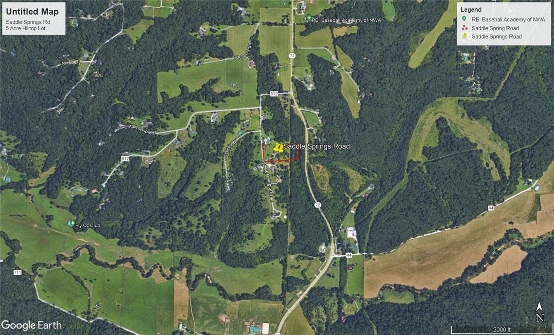 Buildable (Hilltop 5 Acres) rural lot. Sloping wooded area. Just off of HWY 72 and 5 min drive to E Central Ave, Downtown Bentonville & the New Walmart Campus.
