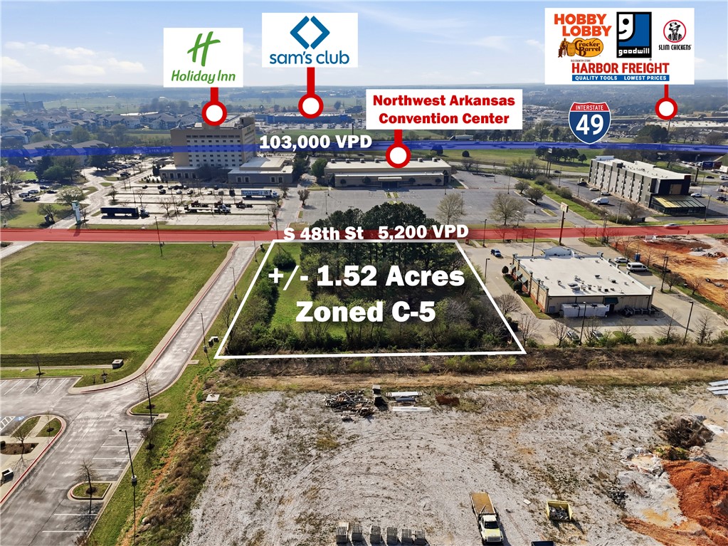 +/- 1.52 Acre commercial land opportunity offering exceptional visibility and development potential in a high traffic Northwest Arkansas corridor, located less than 0.5 miles from I-49. Zoned C-5, thoroughfare commercial, the property supports a wide range of uses including retail, office, restaurant, hotel/motel, medical, and institutional development. All major utilities on site, including water, sewer, electricity, and telecommunications, allowing for a streamlined development process. The site is positioned in a strong retail and hospitality area, surrounded by national brands such as Sonic Drive-In, Phillips 66, Denny's La Quinta Inn & Suites, and Waffle House. Located directly across from the Northwest Arkansas Convention Center, the property benefits from consistent traffic, strong consumer demand, and excellent exposure. With immediate access to one of the region's primary transportation corridors, this site presents a high value investment and development opportunity in one of the fastest growing markets.