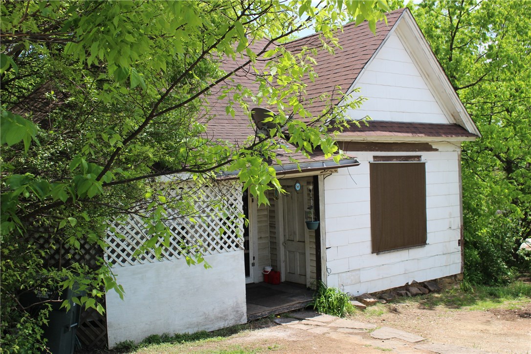 Great Investment Property With Downtown General Zoning! Value Is In The Land And Location!  This old house has some potential, but the land has access either from S College or from the Alley behind it.  Many uses are acceptable in Downtown general zoning, and alley frontage is do-able!  New homes being built on this same block of S. College! Could build upwards and have up to 4 small townhouses or tiny houses.RS4