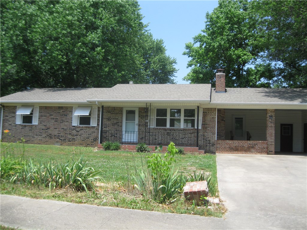 Beautiful home in the Smith ADD Subdivision. Features include 3 bedrooms, 1 1/2 baths with oversized laundry room. Pantry, Storm Shelter off back porch. Out building, Wheel chair accessible. Huge chain link back yard. Walking distance to Pea Ridge high school.